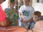 Carl, Kristen, and Brendan Oachs looking on